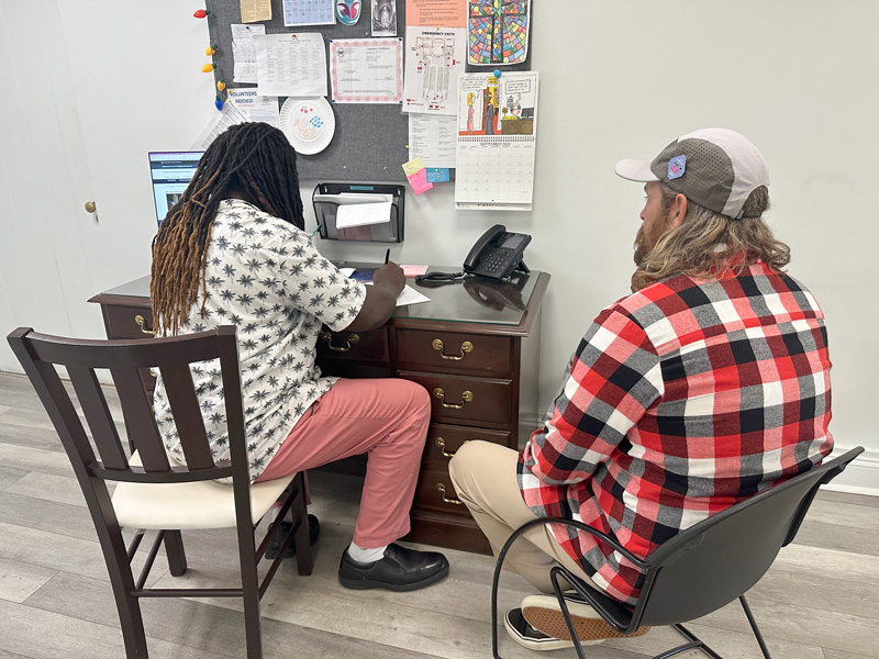 Our caseworker with a client